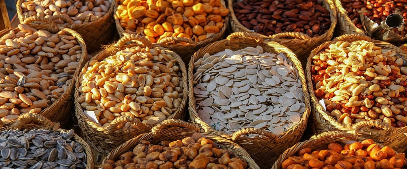 beta sitosterols and nuts grains for hair loss photo of wide range of seeds nuts and grains on large table in souk
